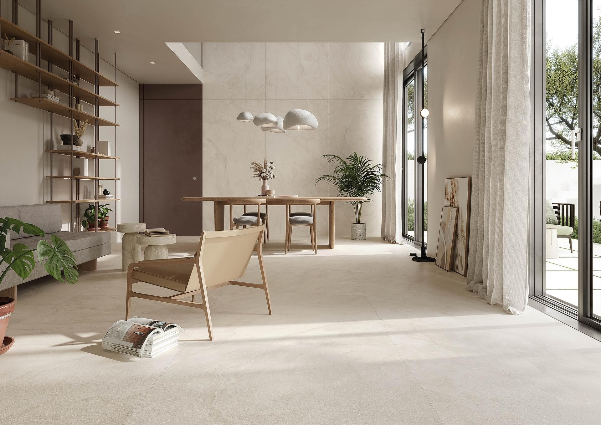 Open-plan living and dining area in stone effect Open-plan living and dining area with matt light stone-effect floor and wall slabs and glazed doors to a terrace