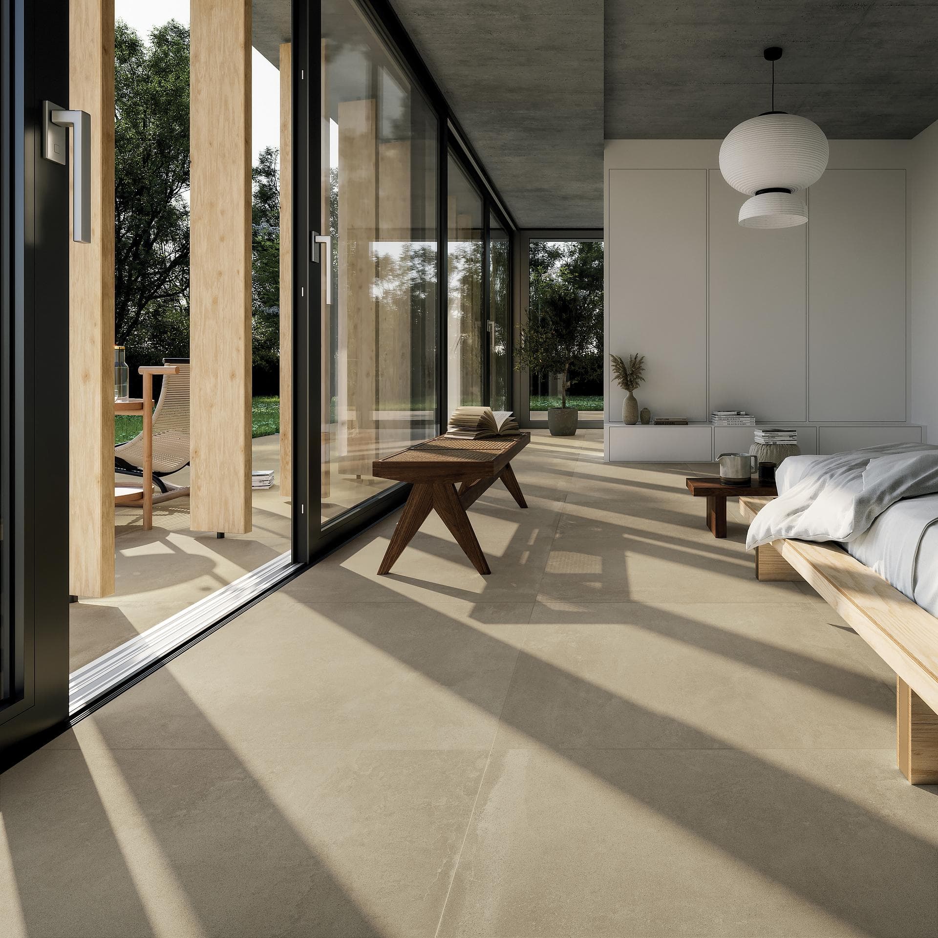 Chambre au sol effet béton sable Chambre avec baies vitrées coulissantes et sol 90x90 effet béton sable mat se prolongeant à l'extérieur