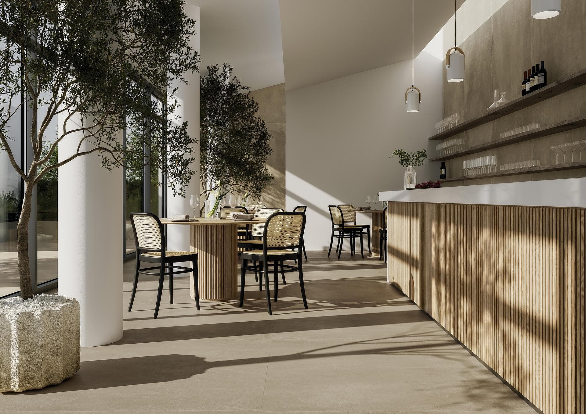 Restaurant room with bar counter and concrete-effect tiles Restaurant room with slatted wood counter, floor and wall behind the shelves in hazelnut concrete-effect tiles