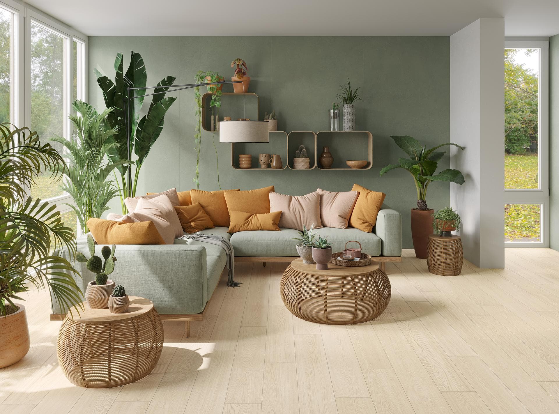 Living room with sage green wall and wood-effect floor Living room with matte sage green wall and light wood-effect plank floor, corner sofa, rattan tables and plants