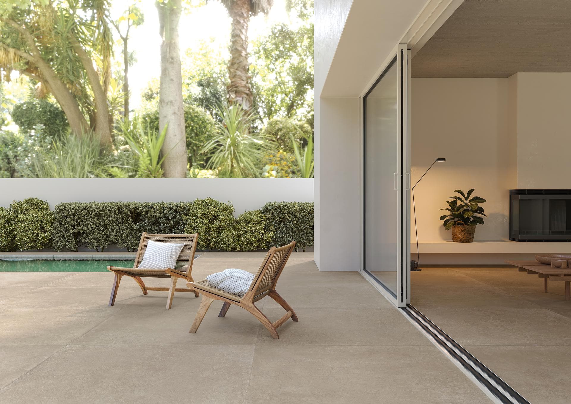 Beige porcelain terrace facing the garden View the gallery