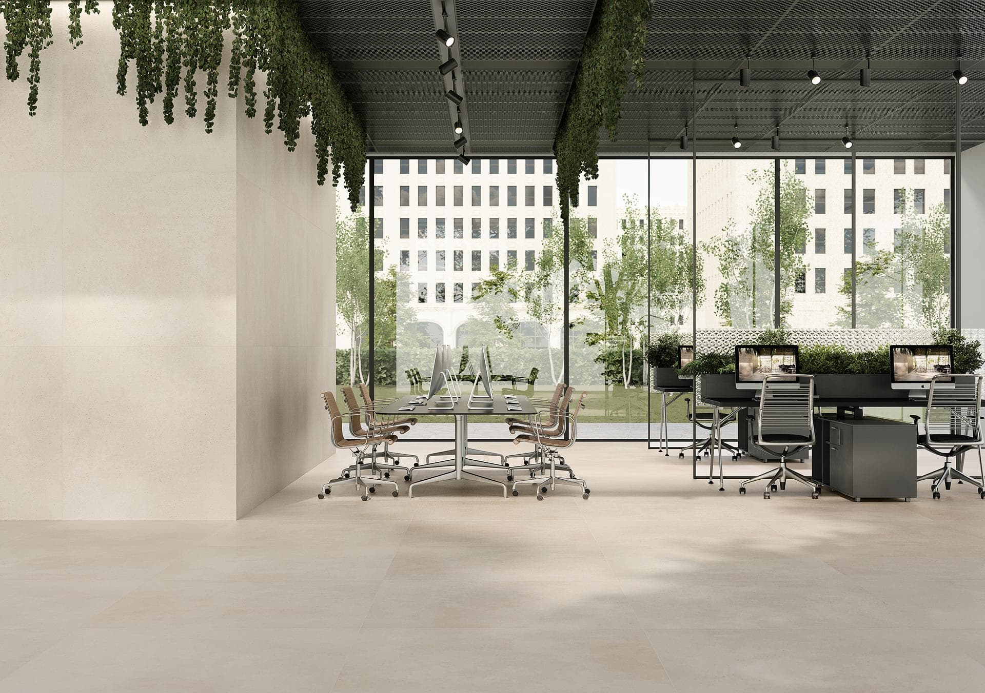 Open-plan office with porcelain floor and wall Open-plan office with glass walls and hanging plants, floor and wall in light 120x120 porcelain tiles