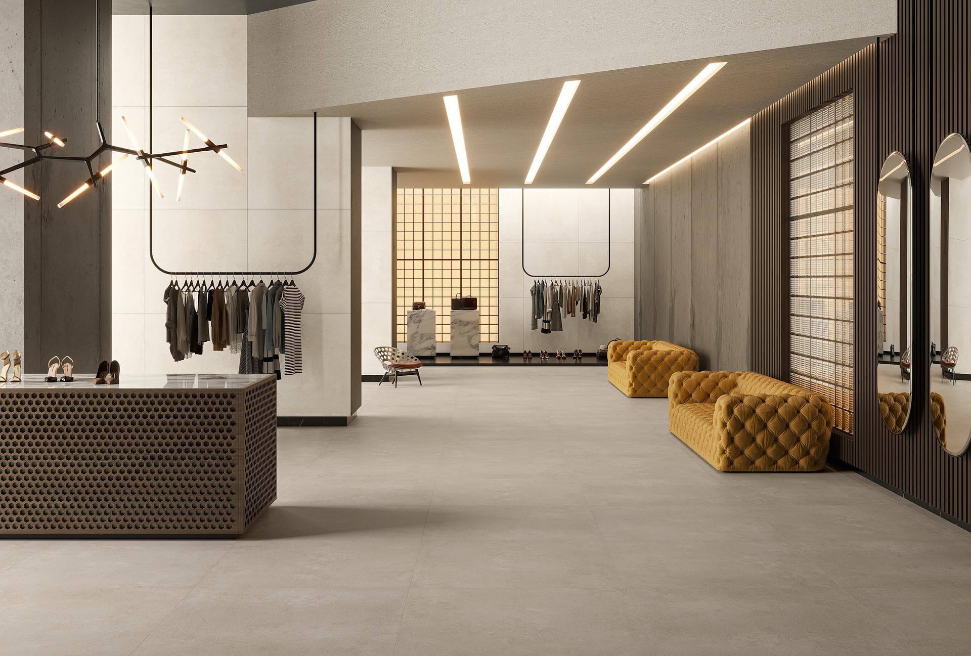 Clothing store with grey porcelain stoneware floor Clothing store interior with matt grey 120x120 porcelain floor and semi-polished extra white wall tiles