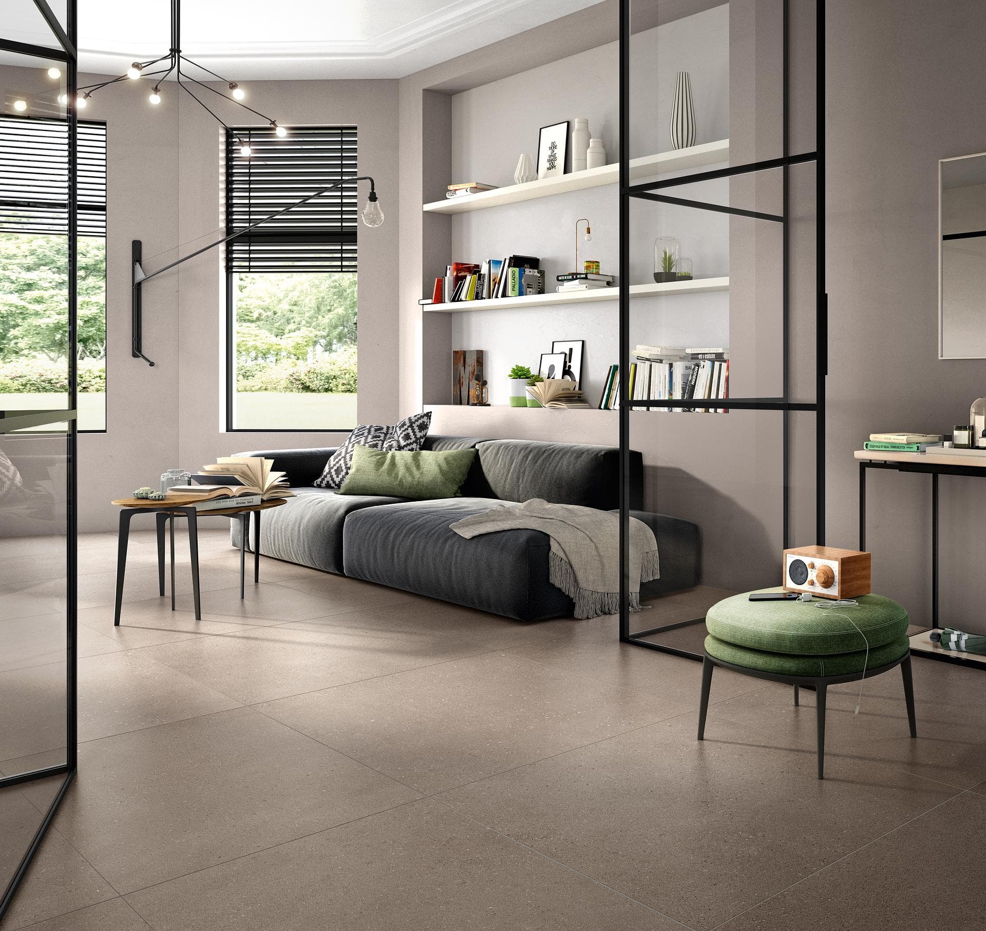 Living room with dark beige concrete-effect floor Living room with grey sofa and black glass partition, matt dark beige concrete-effect 90x90 floor tiles